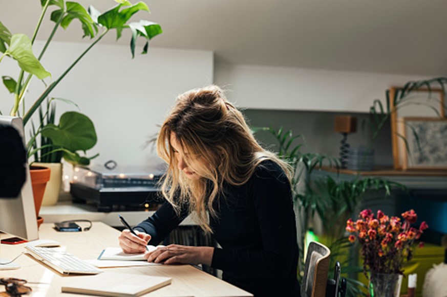 Young Caucasian Female Professional Working from Home